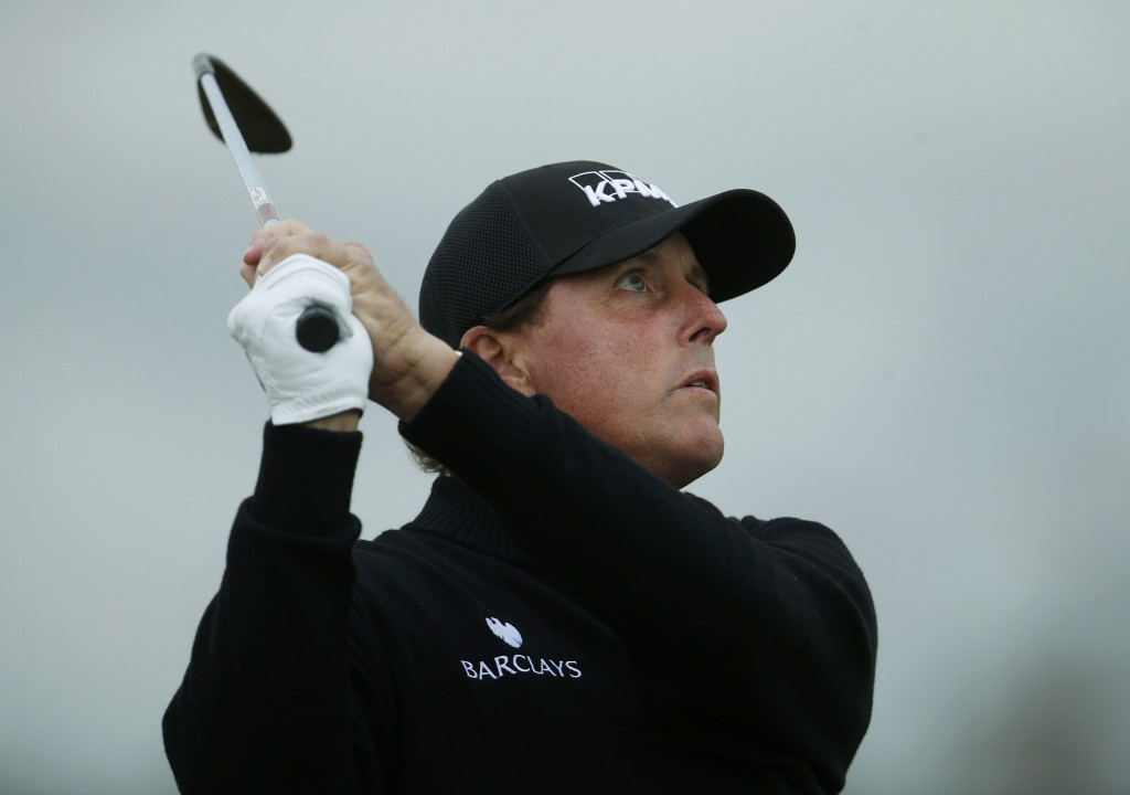 Mickelson of the U.S. watches his shot on the second hole during a practice round ahead of the British Open golf championship on the Old Course in St. Andrews, Scotland